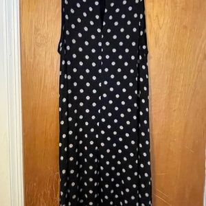 Sleeveless black cotton a-line dress with pink circle design